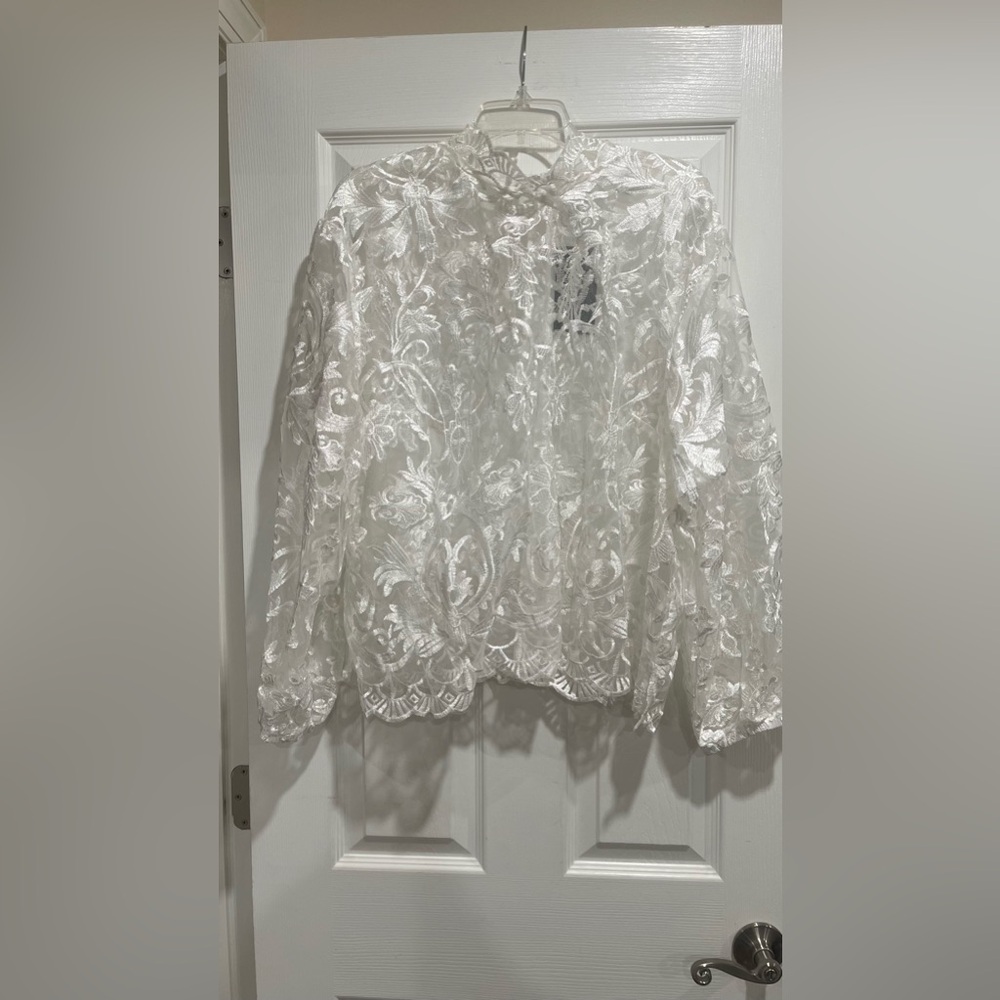 White ornate lace blouse